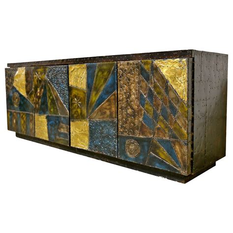 how much is an vintage evans cabinet steel|paul evans bronze paintings.